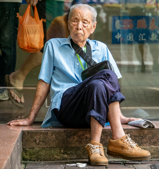 man sitting on floor
