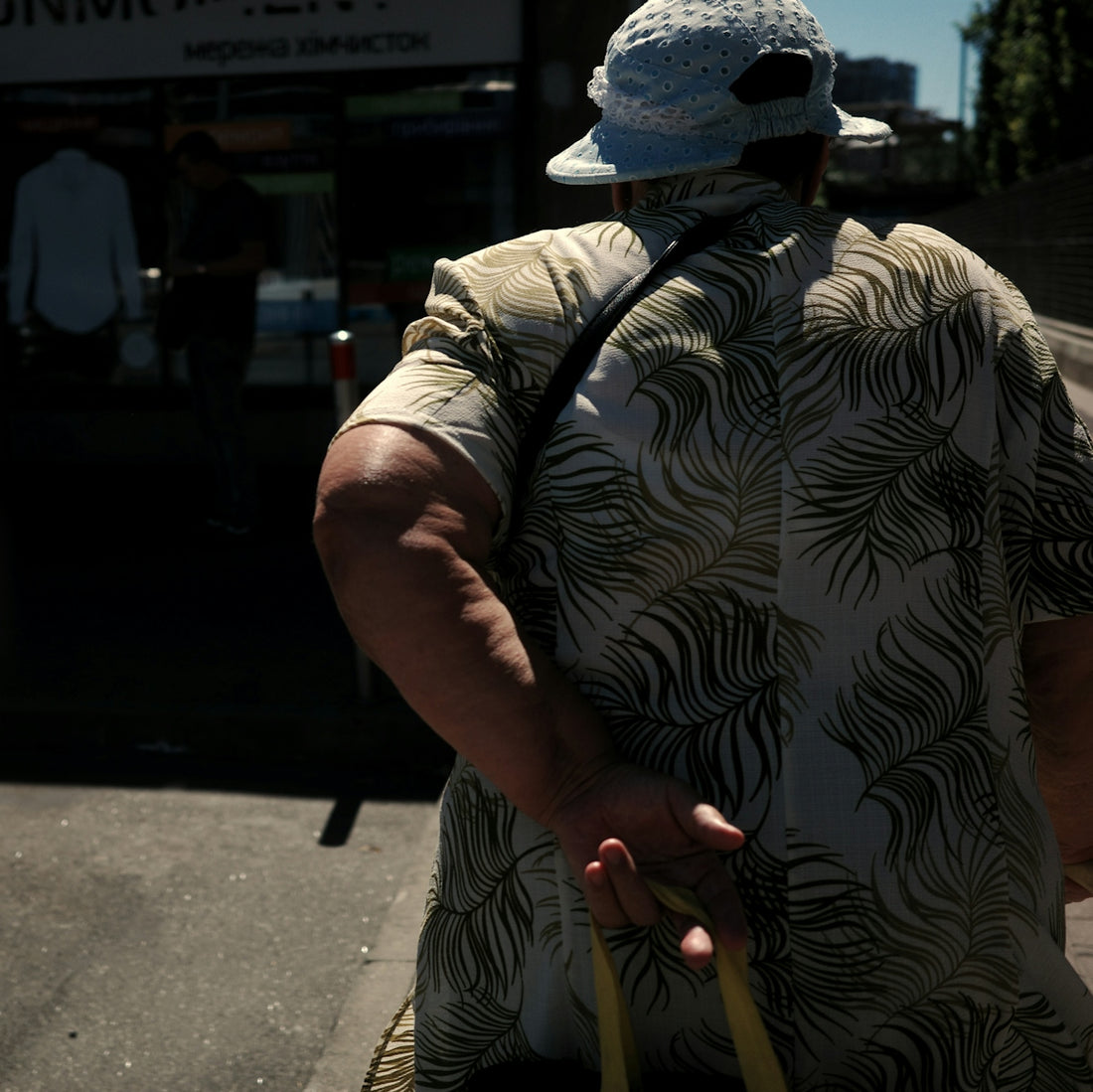 A person with a palm-print shirt.